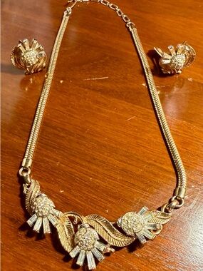 Crown Trifari Alfred Phillippe Radiance Thistle shocker and clip earrings.